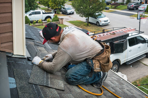 Professional Storm Damage Roof Repair technician working in Triangle, VA